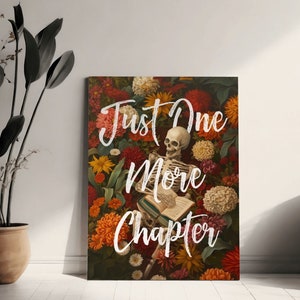 May include: A skeleton reading a book surrounded by colorful flowers. The text reads "Just One More Chapter".