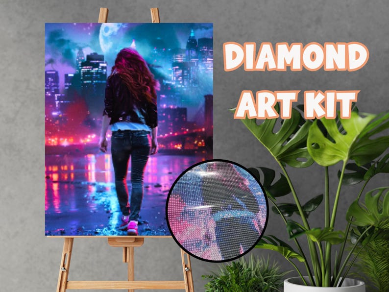 May include: Diamond art kit featuring a woman walking away from the viewer in a city at night. The artwork is displayed on an easel. The kit includes a close-up of the diamond art. The words "DIAMOND ART KIT" are displayed in orange.