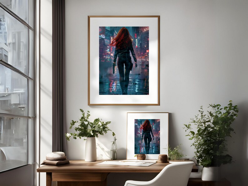 May include: A framed print of a woman with red hair walking down a city street at night. The woman is wearing a black leather jacket and jeans. The city is lit up with neon lights.