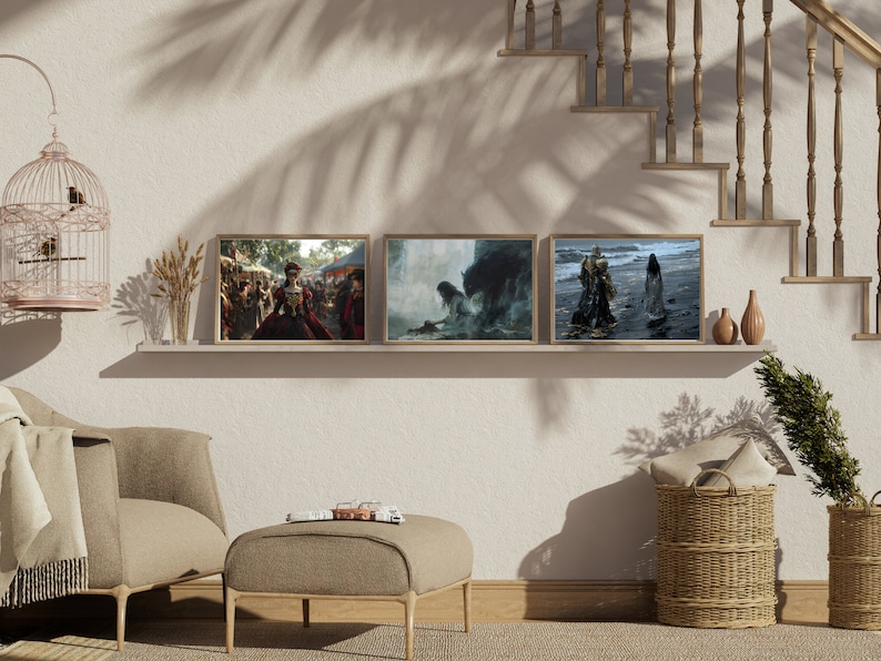 May include: Three framed pictures on a shelf against a white wall. The pictures are of a woman in a red dress, a misty forest scene, and a woman walking on a beach.