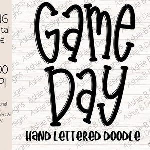 May include: Black and white hand-lettered doodle that says "Game Day".
