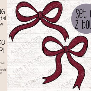 May include: A set of two burgundy bows, each with a simple, elegant design. The bows are perfect for adding a touch of festive flair to any project.