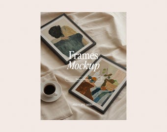 May include: Two framed art prints with black frames are displayed on a beige surface. One print depicts an embrace, the other a still life with a basket of fruit. The words "Frames Mockup" are in the center of the image.