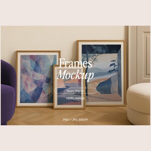 May include: Three framed art prints with abstract watercolor designs in shades of blue, purple, and beige. The frames are a light wood color. The image includes the text "Frames Mockup".