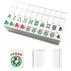May include: A complete set of white Mahjong tiles with black markings and clear plastic tile holders. The tiles feature Chinese characters, numbers, and dragon symbols in red and green. One tile reads "JOKER".