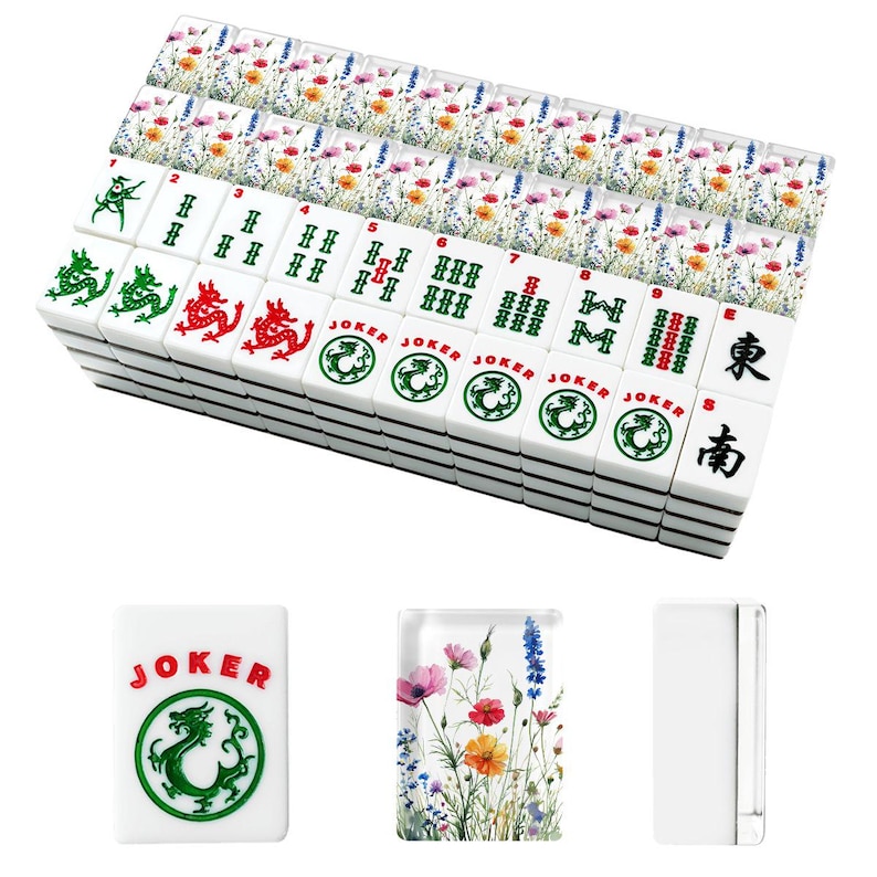 May include: A complete Mahjong set with white tiles featuring green and red Chinese symbols, numbers, and dragon designs. The set includes floral-patterned tile racks and a "JOKER" tile with a green dragon.