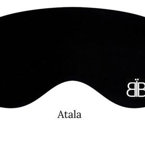 May include: Black sleep mask with a white "BB" logo and the word "Atala" printed below.