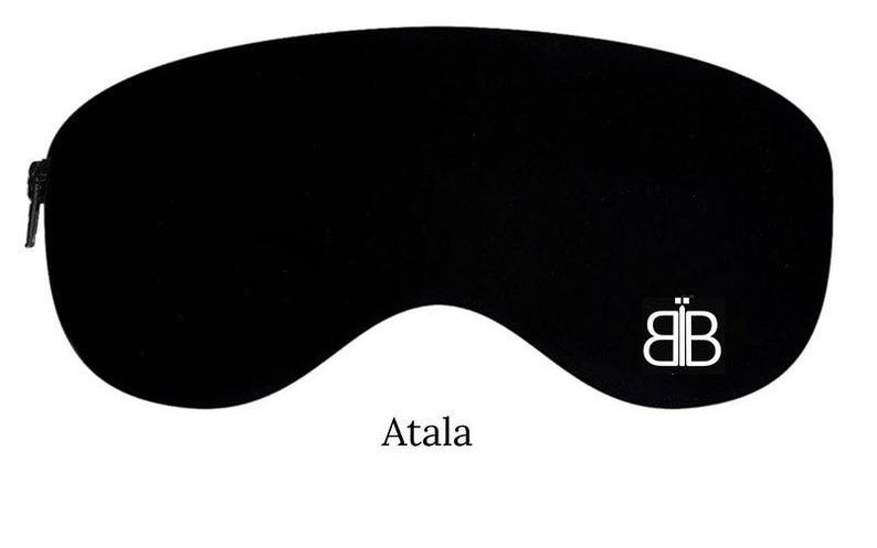 May include: Black sleep mask with a white "BB" logo and the word "Atala" printed below.
