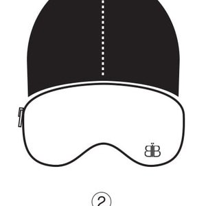 May include: A black sleep mask with a white butterfly logo and the word "EXTEND" in a circle with the number "2" inside. The mask is shown with an arrow pointing upwards, indicating that it can be extended.