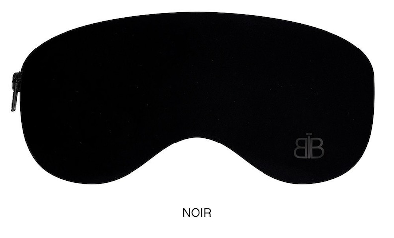 May include: Black sleep mask with a small "BB" logo in the centre.