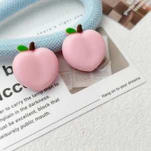 Empuñaduras para pulgar de color melocotón rosa: tapas de joystick kawaii para Switch/Switch Lite/Switch OLED
