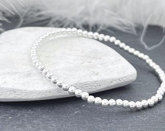 Pulsera elástica de plata de ley con cuentas: Joyería minimalista apilable con cuentas.