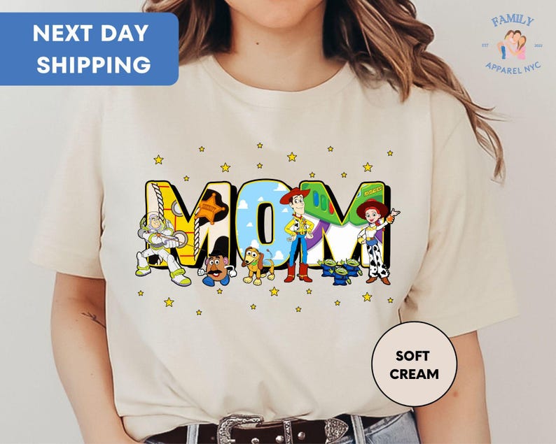 a woman wearing a t - shirt with the word mom printed on it