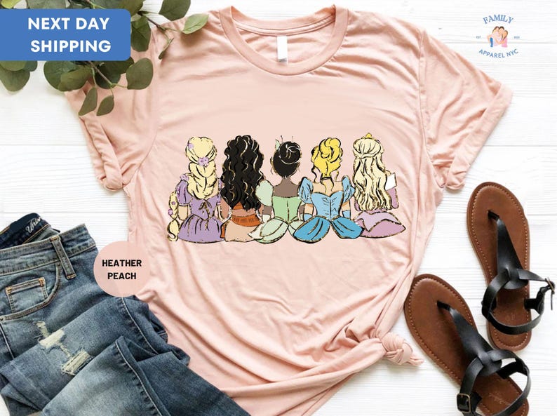 a t - shirt with a picture of a group of princesses on it