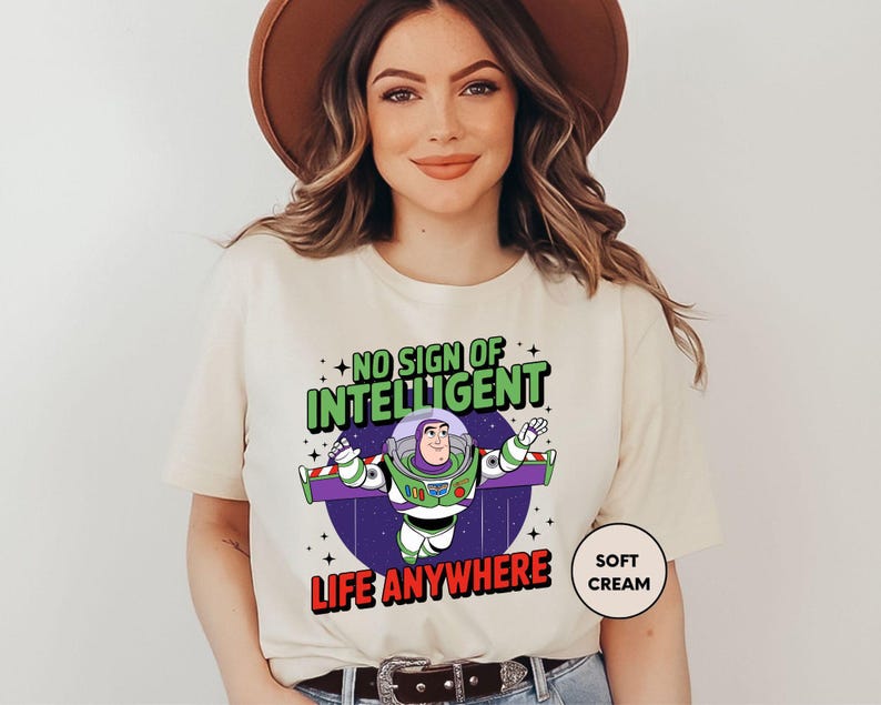 a woman wearing a t - shirt that says, no sign of intelligent life anywhere