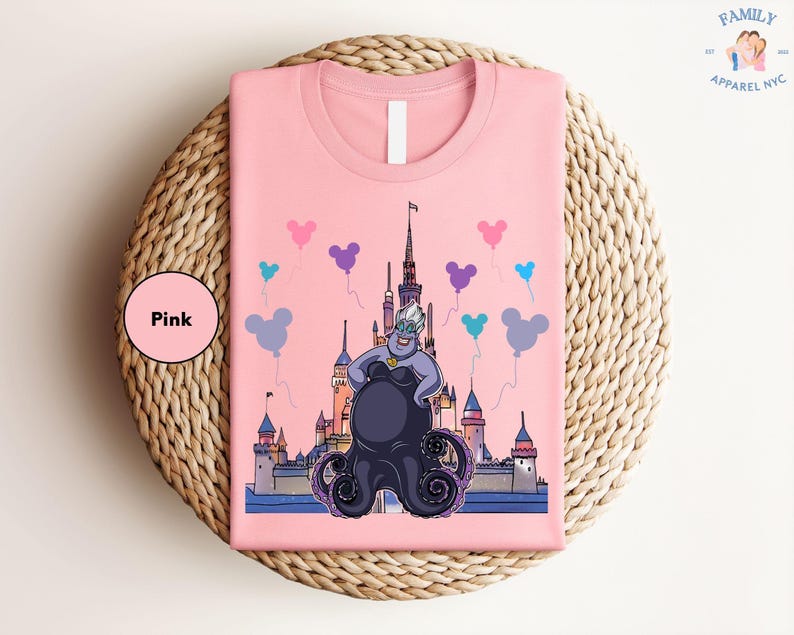 a pink shirt with a picture of a cartoon character on it