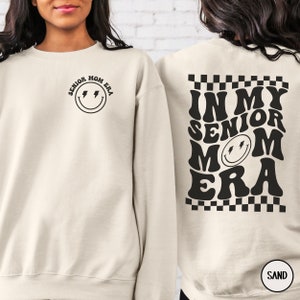 In My Senior Mom Era Sweatshirt, 2025 Senior Mama Sweater, Proud Senior Mom Crewneck, Senior Football Mom Gift, Mom Group Shirts, Funny Tee