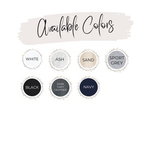 May include: Available Colors: White, Ash, Sand, Sport Grey, Black, Dark Grey Heather, Navy.  A visual guide to the color options for a product.