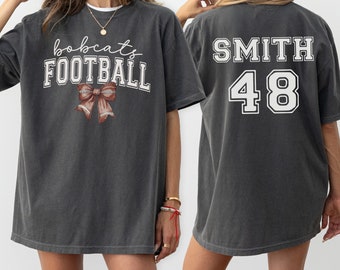 CUSTOM Football Team Comfort Colors® Shirt, Personalized Name Football Bow T-Shirt, Coquette Football Mom Gift, Game Day Football Season Tee