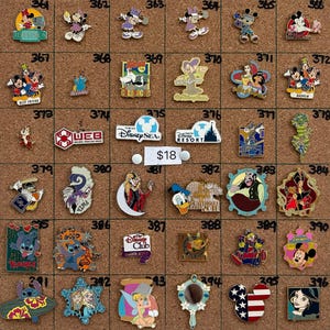 May include: A collection of assorted Disney character enamel pins arranged in a grid on a cork board, each labeled with a number from 361 to 396. The pins feature various figures, logos, and designs, including Mickey Mouse, Stitch, and Tinker Bell.