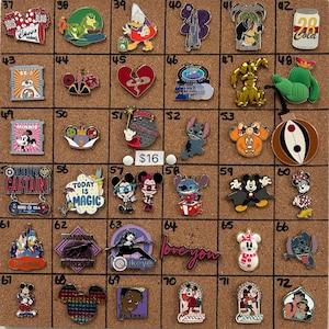 May include: A collection of assorted Disney-themed enamel pins arranged in a grid on a cork board, featuring various characters, logos, and text designs including Minnie Mouse, Stitch, Marvel icons, and holiday motifs, each labeled with a number.