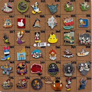 Disney pins Vintage Pixie Plush, Haunted Mansion, hidden Mickey, Mickey Mouse Jafar Tiki Jungle Cruise