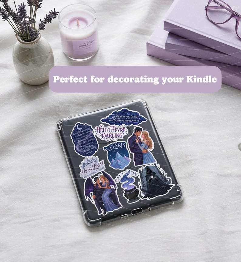 May include: A clear protective case for an e-reader featuring a collection of fantasy-themed stickers. The stickers display illustrations of a couple, a mountain range, a cauldron, and text including Hello Feyre Darling, Velaris, and High Lady.