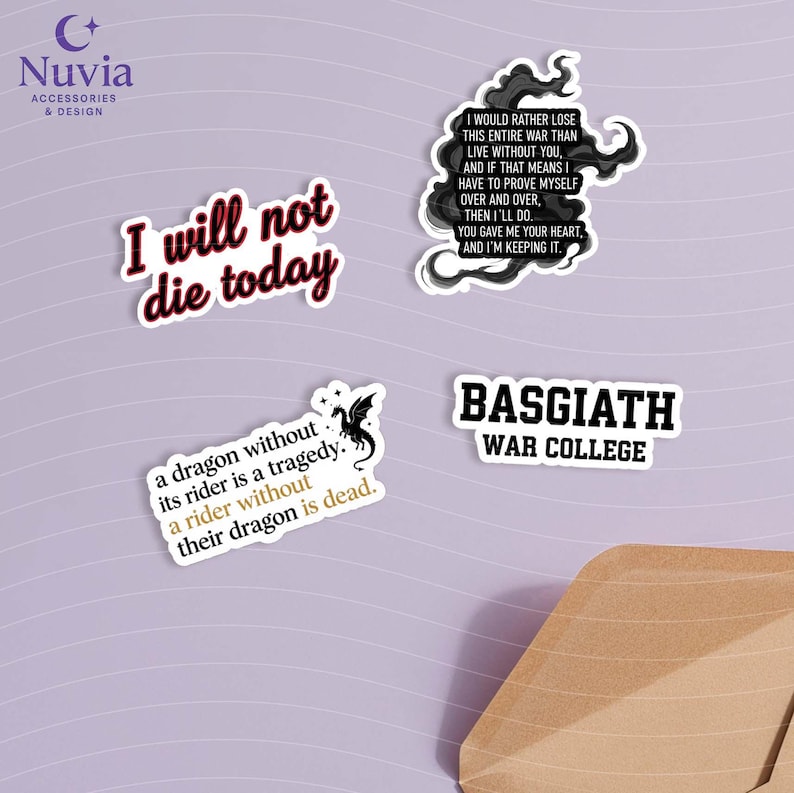 May include: A collection of white stickers with black text and designs. One sticker reads "I will not die today" in a bold font. Other stickers feature quotes and a dragon illustration. The stickers are on a light purple surface.