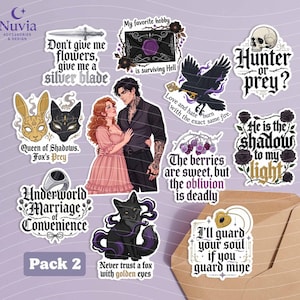 May include: A collection of fantasy-themed stickers with various designs and quotes. Includes images of a raven, a skull, a couple, a fox, and other mystical elements. Text includes "Hunter or prey?" and "Never trust a fox with golden eyes."
