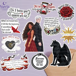 May include: A collection of vinyl stickers featuring fantasy-themed illustrations and quotes. Designs include a couple, a black winged wolf, a red rose, a skull, a heart with a key, an hourglass, a sun emblem, and text-based graphics with flames.