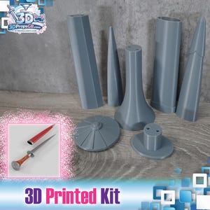 May include: A collection of gray 3D-printed kit components, including various shapes like cones, cylinders, and a circular piece. A small inset shows a dagger with a red sheath. The text "3D Printed Kit" is at the bottom.