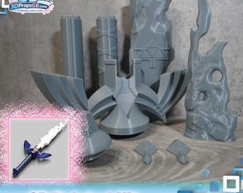 May include: A 3D printed kit featuring various gray components, including architectural structures and geometric shapes. A miniature sword with blue and white details is also included. The text "3D Printed Kit" is displayed at the bottom.