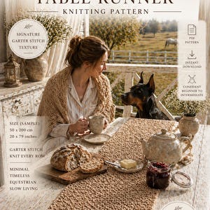 May include: A knitted table runner with a garter stitch texture, measuring 20 x 79 inches. The design is described as minimal, timeless, and equestrian. The image also features a woman, a dog, and a table setting.