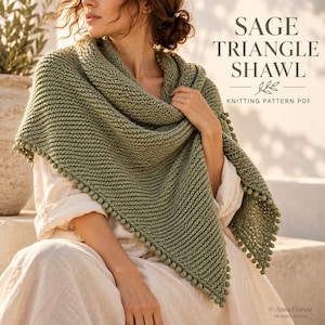 Peut inclure: Un châle triangulaire tricoté en vert sauge avec une texture au point mousse et une bordure décorative à pompons. Le texte SAGE TRIANGLE SHAWL KNITTING PATTERN PDF est visible dans le coin supérieur droit de l'image.
