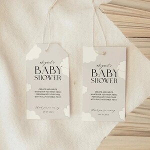 May include: Two light grey baby shower favour tags with white clouds and black text. The text reads "abigail's Baby Shower" and "Create and write whatever you wish here. Personalise your tags with fully editable text. Thank you for coming 09.19.2021".