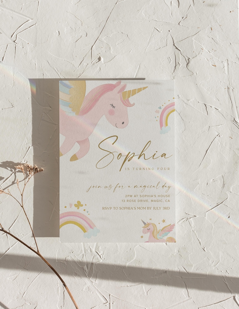 May include: A pastel-colored invitation featuring a pink unicorn with a golden horn and wings, and a rainbow. The invitation reads "Sophia is turning four" and includes event details. The design is whimsical and suitable for a child's birthday.