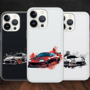 Peut inclure: Trois coques de téléphone avec des designs différents mettant en scène une voiture de sport rouge, blanche et noire. Les coques sont transparentes et montrent l'objectif de l'appareil photo du téléphone.