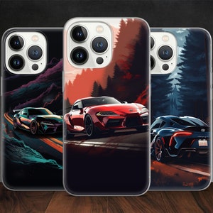 May include: Three clear phone cases with different designs featuring a red, blue, and black sports car on a winding road. The cases are for an iPhone with a camera bump.