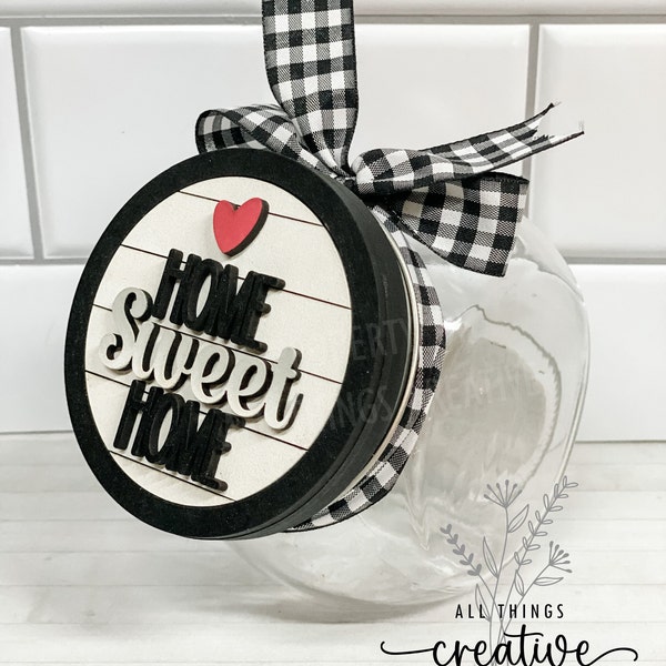 Glass Candy Jar Container with Removable Lid and a 3 inch Home Sweet Home  Interchangeable Circle Insert.