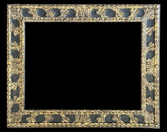 23" x 30" solid wood hand carved frame, gold leaf & black panel