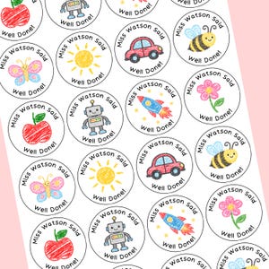May include: A sheet of round stickers with colorful illustrations of a red apple, robot, sun, car, rocket, bee, and flower. Each sticker has the text "Miss Watson Said" and "Well Done!" in a handwritten style.
