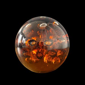 Oversized controlled bubbles paperweight