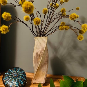 Twisted vintage pottery vase