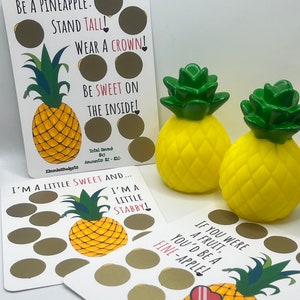 May include: Three printable pineapple-themed scratch-off cards with gold circles. The cards have the text "Be a Pineapple: Stand Tall! Wear a Crown! Be Sweet on the Inside!"  "I'm a Little Sweet and... I'm a Little Stabby!" and "If you were a fruit, you'd be a fine-apple!"