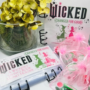 Sparutmaningsbok Wicked Change For Good | 8 actionfyllda spel | Speldelar ingår | Möjlighet till sparbok med penninghållare