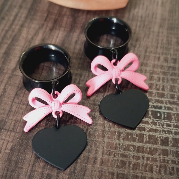 Pink bows dangle plugs dangle gauges