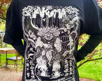 Camiseta de Akuma de Street Fighter 6