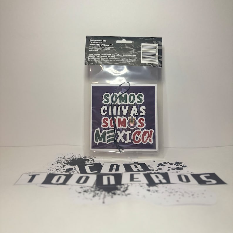 May include: A purple and white car air freshener with the text "Somos Chivas Somos Mexico!" and a soccer team logo.