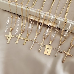 May include: Nine gold chains in different styles, each with a gold cross pendant. The chains are labelled with their names: Beads Chain, Mariner Chain, Box Chain, Rope Chain, Paperclip Chain, Dainty Chain, Curb Chain, and Snake Chain.