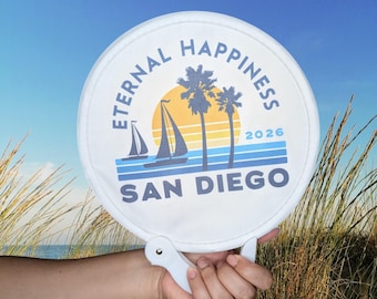 San Diego 2026 Eternal Happiness Handheld Fan – Foldable, Double-Sided Pop-Up Souvenir with Storage Bag. Available in single or bulk packs.